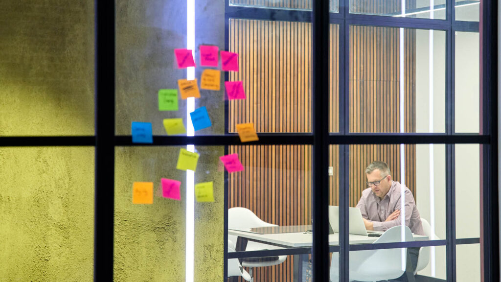 TXP team member works in a modern working space