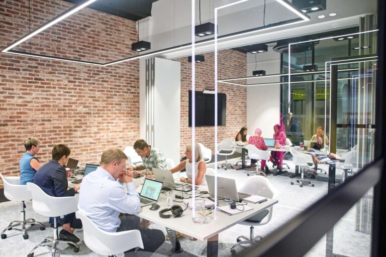 TXP staff work in modern office